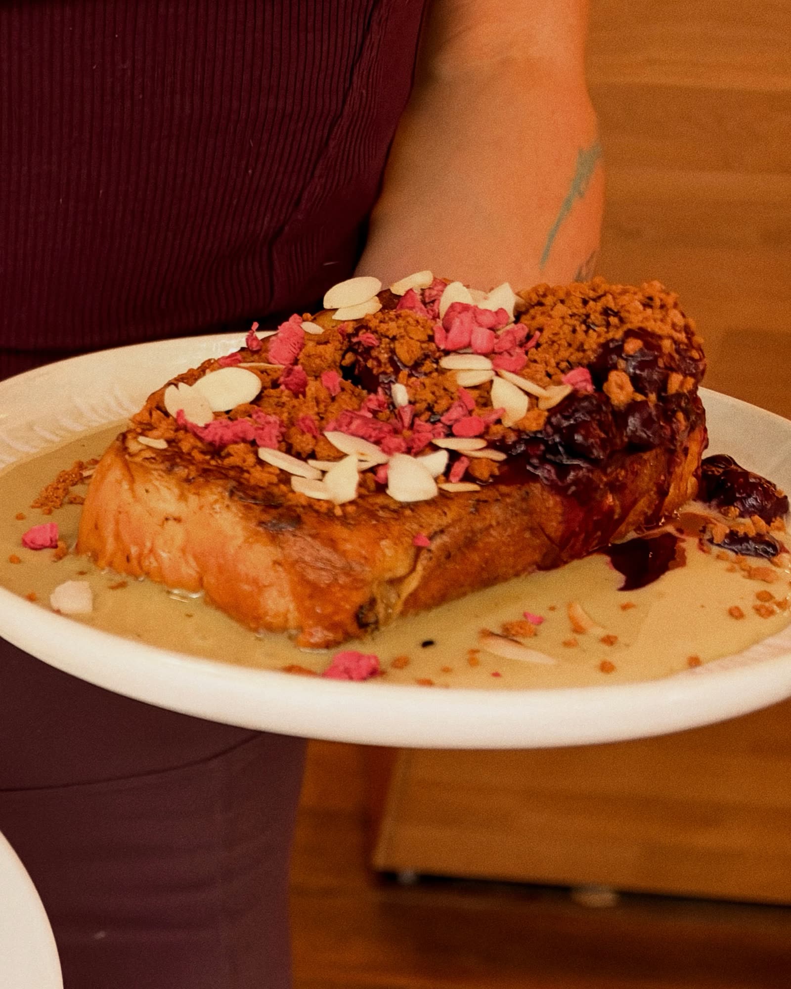 French toast with pistachio cream, almonds and berries